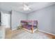 This bedroom features neutral carpet and a modern bed frame at 2639 Oleander Dr, Durham, NC 27703