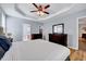 Spacious main bedroom features wood floors, tray ceiling, and a walk-in closet at 2639 Oleander Dr, Durham, NC 27703
