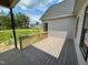 Beautiful back deck overlooking a lush backyard, perfect for outdoor entertaining at 27 Batten Hill Ln, Selma, NC 27576