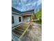 Backyard featuring an in-progress wooden deck, perfect for outdoor living and entertaining at 27 Batten Hill Ln, Selma, NC 27576