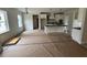 Modern kitchen with a central island, stainless steel appliances, and plenty of counter space at 27 Batten Hill Ln, Selma, NC 27576