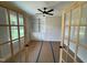 Office with built-in bookshelves and glass French doors, offering a bright and functional workspace at 27 Batten Hill Ln, Selma, NC 27576