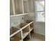 Functional pantry with custom shelving, providing ample storage for groceries and kitchen essentials at 27 Batten Hill Ln, Selma, NC 27576