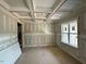 Elegant room featuring a coffered ceiling and large window, perfect for creating a sophisticated living space at 27 Batten Hill Ln, Selma, NC 27576