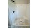 Bathroom featuring a white shower and tub combination at 27 Batten Hill Ln, Selma, NC 27576
