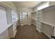 Large walk-in closet with custom shelving, providing ample storage and organization at 27 Batten Hill Ln, Selma, NC 27576