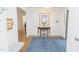 Inviting foyer with a decorative rug, wooden table, and soft, natural lighting at 2715 Freemont Rd, Durham, NC 27705