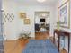 Bright foyer with hardwood floors leading into a spacious living area, complete with stylish furnishings at 2715 Freemont Rd, Durham, NC 27705