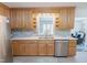Kitchen with stainless steel appliances, light countertops and mosaic tile backsplash at 2715 Freemont Rd, Durham, NC 27705