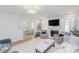 Open living room with view to dining area, fireplace, and comfortable seating at 2715 Freemont Rd, Durham, NC 27705