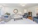Cozy living room with plush seating, soft carpet, and elegant decor at 2715 Freemont Rd, Durham, NC 27705