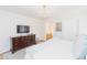 Main bedroom featuring a TV, ensuite bath and a stylish, comfortable bed at 2715 Freemont Rd, Durham, NC 27705
