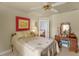 This bedroom has a comfortable bed, a ceiling fan, and a writing desk at 2925 Ericka Dr, Hillsborough, NC 27278