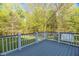 Outdoor deck showcasing scenic views of the expansive backyard and surrounding nature at 2925 Ericka Dr, Hillsborough, NC 27278