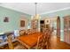 Dining room with spacious table and seating that connects to the living room at 2925 Ericka Dr, Hillsborough, NC 27278