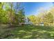 Spacious property with a traditional home, mature trees, and a shed in the backyard at 2925 Ericka Dr, Hillsborough, NC 27278