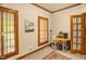 Well-lit office with wooden shutters, neutral paint, and full closet at 2925 Ericka Dr, Hillsborough, NC 27278