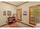 Well-lit office space with built-in bookshelves and window with wooden shutters at 2925 Ericka Dr, Hillsborough, NC 27278