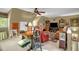 This office space includes lots of seating, a ceiling fan, and military decor at 2925 Ericka Dr, Hillsborough, NC 27278