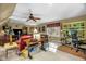 The spacious bonus room includes a ceiling fan, desk area, and a comfortable sitting area at 2925 Ericka Dr, Hillsborough, NC 27278