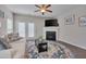 Cozy living room features a fireplace and decorative rug at 3114 Courtney Creek Blvd, Durham, NC 27713