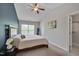 Main bedroom with vaulted ceiling, ensuite bathroom, and neutral decor at 3114 Courtney Creek Blvd, Durham, NC 27713