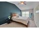 Bedroom featuring a vaulted ceiling and decorative accent wall at 3114 Courtney Creek Blvd, Durham, NC 27713