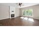 Spacious living room featuring a fireplace and bright windows with natural light at 3302 Colorcott St, Raleigh, NC 27614