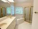 Bathroom suite with double vanity, garden tub, and walk-in shower at 3316 Belspring Ln, Raleigh, NC 27612