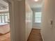 Hallway features built in cabinets with gold hardware and access to the kitchen at 3316 Belspring Ln, Raleigh, NC 27612