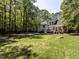 Large, well-maintained backyard with a fire pit and plenty of room for recreation at 3332 Langston Cir, Apex, NC 27539