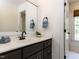 Bathroom vanity with quartz countertop and updated fixtures at 3332 Langston Cir, Apex, NC 27539