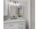 Stylish bathroom vanity with marble countertop and modern fixtures at 3408 Brentwood Rd, Raleigh, NC 27604