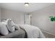 Calm bedroom featuring neutral color scheme, closet, and plush carpet at 3408 Brentwood Rd, Raleigh, NC 27604