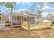 A newly constructed back deck and screened porch offer the homeowner outdoor living space at 3408 Brentwood Rd, Raleigh, NC 27604