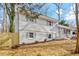 Charming home with white brick and siding, complemented by a well-kept yard at 3408 Brentwood Rd, Raleigh, NC 27604