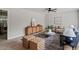 Cozy living room with a mix of seating options, a patterned rug, and natural light at 3408 Brentwood Rd, Raleigh, NC 27604