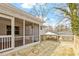 A back deck and screened in porch offer outdoor living space to enjoy the landscape at 3408 Brentwood Rd, Raleigh, NC 27604