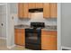 Galley kitchen features laminate countertops and stove with oven at 4000 Volkswalk Pl, Raleigh, NC 27610