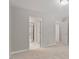 Neutral bedroom with connecting doors and neutral carpet at 4540 Mistiflower Dr, Raleigh, NC 27606
