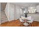 Open floor plan connects dining area to kitchen and staircase, providing a seamless flow throughout the home at 4540 Mistiflower Dr, Raleigh, NC 27606
