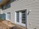 Home back patio with double french doors leading inside, perfect for entertaining at 4602 Millstone Dr # C, Raleigh, NC 27604