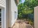View of the backyard features the side of the home at 4602 Millstone Dr # C, Raleigh, NC 27604