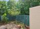 A view of the green fence in the backyard at 4602 Millstone Dr # C, Raleigh, NC 27604