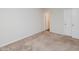Spacious carpeted bedroom with standard lighting and a window at 4602 Millstone Dr # C, Raleigh, NC 27604