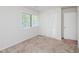 Neutral bedroom features carpet, closet, and a window at 4602 Millstone Dr # C, Raleigh, NC 27604