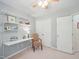 Bedroom featuring shelves and a comfortable chair with natural light from the window at 5026 Celtic Ct, Raleigh, NC 27612