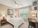 Cozy bedroom with a neutral color scheme, a full sized bed, and a ceiling fan at 5026 Celtic Ct, Raleigh, NC 27612