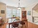 Bright dining room with hardwood floors and a large window, perfect for entertaining at 5026 Celtic Ct, Raleigh, NC 27612
