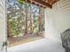 Covered patio with view of wooded backyard, offering a private outdoor space at 5026 Celtic Ct, Raleigh, NC 27612